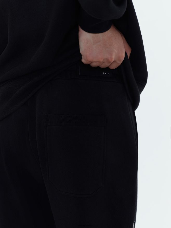 AMIRI hombres negro pantalón deportivo escalonado de marca 6TLR20158